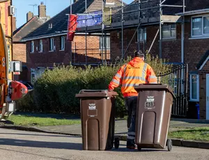 Bin operative wheeling brown bins
