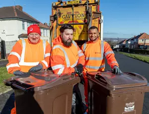 Collection operatives collecting recycling in brown bins